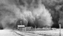 photograph: Black Sunday dust storm approaching Ulysses, Kansas, April 14, 1935