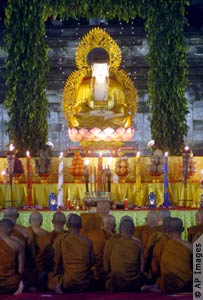 Monks kneeling before an alter (AP Images)
