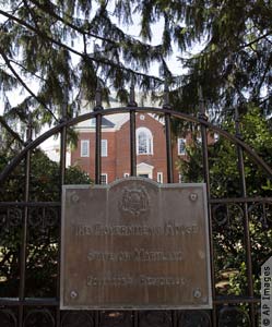 Gate and sign on Government House in Annapolis (AP Images)