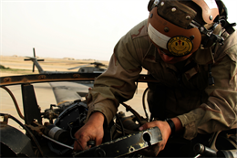 Cpl. Domenico Bauco, a New York native, checks the torque on the main rotor of a CH-53D Sea Stallion at Al Asad, Iraq, March 21. Bauco is a helicopter mechanic with Marine Heavy Helicopter Squadron 463, Marine Aircraft Group 16 (Reinforced), 3rd Marine Aircraft Wing.