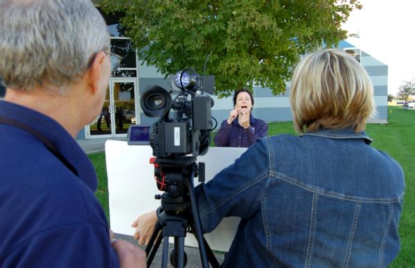 Harrisburg, Pa., October 5, 2011 -- Debi Chrisbacker, ODHH/FEMA Sign Language Consultant tapes a training video explaining the Individual Assistance (IA) program. Chartering new territory FEMA is producing videos in American Sign Language (ASL), voice and open caption to meet the needs of the deaf community. Photo by Michael Mancino/FEMA