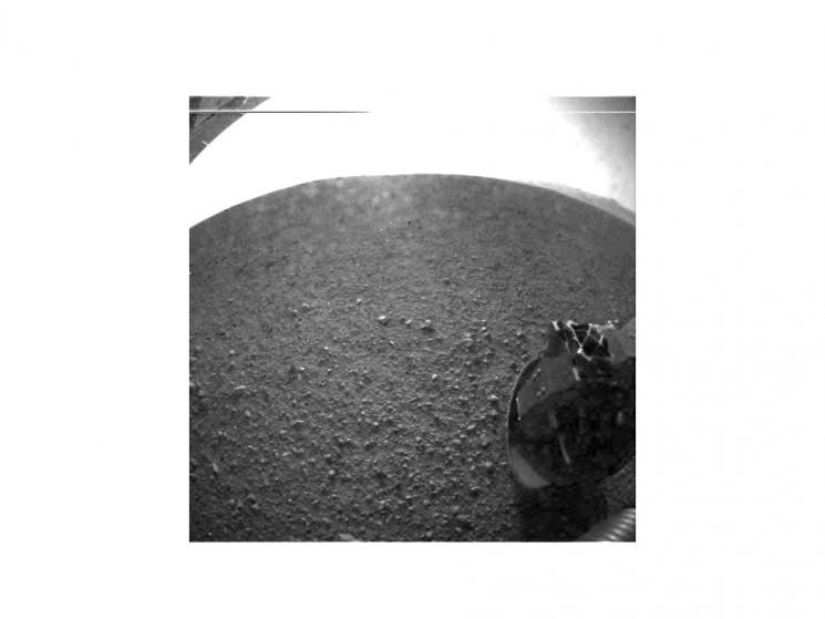 One of the first images taken by NASA's Curiosity rover was taken on the left-rear side of the rover looking directly into the sun. | Photo courtesy of NASA/JPL-Caltech.