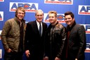On January 8, Director Mueller traveled to Nashville, Tennessee to accept the Tuss McLaughry Award from the American Football Coaches Association. The award, established in 1964, is the organization’s highest honor and is presented to distinguished Americans in recognition of outstanding service to others. Above, Director Mueller poses with members of the band Rascal Flatts, who performed at the ceremony. For more information, see http://www.fbi.gov/news/news_blog/director-receives-award-from-american-football-coaches-association