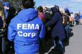 FEMA Corps members talk to residents impacted by Hurricane Sandy