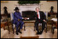 President George W. Bush shakes hands with the First Vice President of the Government of National Unity of Sudan and President of the Government of Southern Sudan Salva Kiir Mayardit during his visit Monday, Jan. 5, 2009, to the Oval Office of the White House.  White House photo by Eric Draper