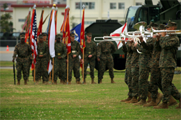 The III Marine Expeditionary Force bands marches down the parade deck in front of the troops as part of the change of command ceremony Jan. 7 at Camp Foster on Okinawa, Japan.