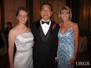 USGS research hydrologist Paul Hsieh (center) with his wife Christine Peterson (left) and USGS Director Marcia McNutt (right) attend the Service to America Medals gala event, where Paul Hsieh's was honored as the 2011 Federal Employee of the Year by the Partnership for Public Service. Hsieh was awarded for providing critical scientific information that proved to be a turning point in ending the worst oil spill in our Nation's history.