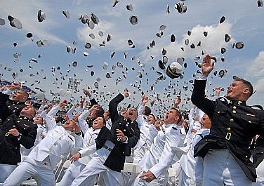 Newly commissioned Navy and Marine Corps officers toss their hats during the U.S. Naval Academy Class of 2011 graduation and commissioning ceremony. The Class of 2011 graduated 728 ensigns and 260 Marine Corps 2nd lieutenants at Navy-Marine Corps Memorial Stadium in Annapolis, Md.  U.S. Navy photo by Mass Communication Specialist 1st Class Chad Runge (Released)  110527-N-OA833-014