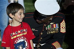 Marine shares a laugh with Tragedy Assistance Program for Survivors Participant