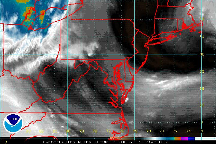 A recent water vapor image from GOES-12, zoomed in over a tropical disturbance.  Click on the image for a larger view.