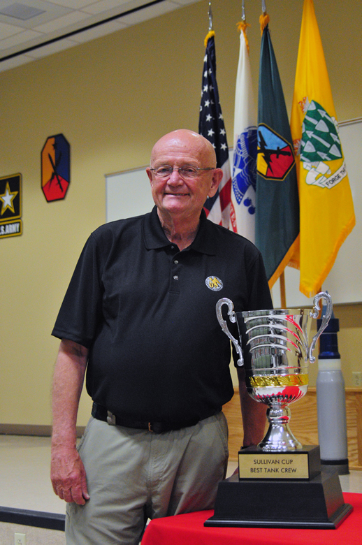 Gordon Sullivan standing next to the Sullivan Cup