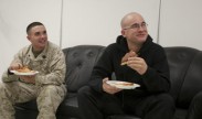 Petty Officer 3rd Class Richard Burski and Pfc. Ian Foster eat pizza and watch Super Bowl XLVII at the Wounded Warrior Section berthing area aboard Camp Leatherneck Feb. 4. Photo by Sgt. Bobby J. Yarbrough