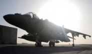 An AV-8B Harrier II Plus with Marine Attack Squadron 211, 3rd Marine Aircraft Wing (Forward), awaits its next mission on the tarmac at Camp Bastion, Afghanistan, Sept. 18, 2012. The aircraft provides air support to the ground units throughout Helmand and Nimroz provinces. Despite a roller coaster week for the squadron, VMA-211 remains fully operational and continues to provide support to ground troops throughout Regional Command Southwest’s area of operations. Photo by Cpl. Timothy Lenzo