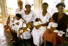 Photo of women with children in a clinic waiting room. Source: Ellen Ogden
