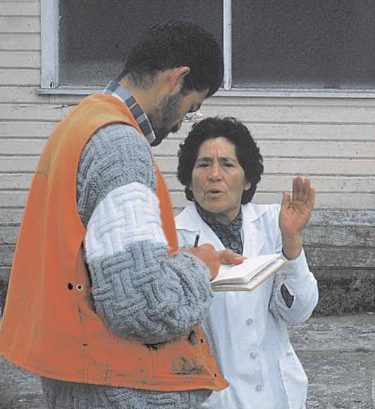 photo of two people talking