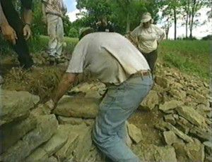 Cover stones help bind the wall together.