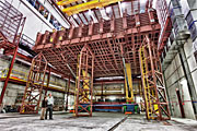 Technicians use this gigantic pivoter machine to position the 28 blocks of the 14,000-ton NOvA particle detector.