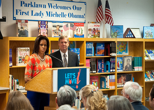 First Lady Michelle Obama joined Agriculture Secretary Tom Vilsack at Parklawn Elementary School to speak with faculty and parents about the United States Department of Agriculture’s new and improved nutrition standards for school lunches. An important accomplishment of the Healthy, Hunger-Free Kids Act that President Obama signed into law last year. Also, in In February 2010, First Lady Michelle Obama introduced “Let’s Move” incorporating the HealthierUS School Challenge into her campaign to promote a healthier generation of children. USDA is making the first major changes in school meals in over 15 years. The new standards encourage fruits and vegetables every day of the week, increasing offerings of whole grain-rich foods, offering only fat-free or low-fat milk and making sure kids are getting proper portion sizes at the Parklawn Elementary School Alexandria, Virginia, on Wednesday, January 25, 2012.  USDA Photo by Bob Nichols.