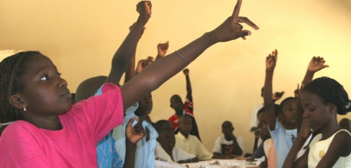 Children reading textbooks