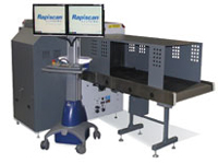 Rapiscan 620DV provides both a horizontal and vertical X-ray view of carry-on luggage.  These two perpendicular views provide a complete perspective regardless of their orientation inside the system.  Automated explosives detection software is also applied to scanned images. (Image: TSA)