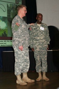 LTG Eric B. Schoomaker, the Army Surgeon General, commends SFC Derrick Brown for instituting monthly Purple Heart ceremonies at Walter Reed Army Medical Center.