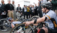 Army Secretary John M. McHugh speaks with Army cycling team members Tim Patterson and Juan Soto before the beginning of the 2012 Warrior Games in Colorado Springs, Colo., May 1, 2012. U.S. Army photo by Sgt. 1st Class Raymond Piper