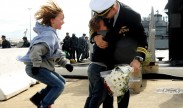 Photo: Children welcome home their father and the crew of the Los Angeles-class attack submarine USS Norfolk (SSN 714) from a six-month deployment at Naval Station Norfolk. Norfolk completed more than 30,000 nautical miles during the deployment and conducted port visits to Haifa, Isreal; Limassol, Cyprus; Bahrain and Diego Garcia. (U.S. Navy photo by Mass Communication Specialist 1st Class Kim Williams/Released)