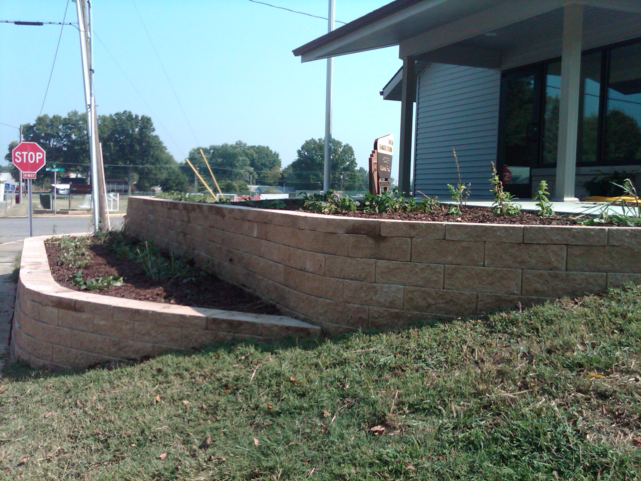 Terraces in front of the new office show off the native plant landscaping.