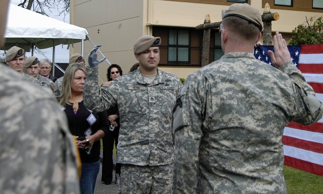 Then-Staff Sgt. Leroy Petry re-enlists with the Rangers during a ceremony in May 2010 at Fort Lewis, Wash.