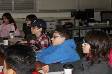 Sixth grade students from Yokota Middle School anxiously call sighting numbers off to find Jupiter’s peak.