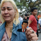 Photo: Story - Hugo Chavez's Death and Venezuela’s Future: http://yhoo.it/WJMEUQ

Photos: Venezuelans Mourn the Death of Hugo Chavez http://abcn.ws/ZmV5H4

A supporter of Venezuelan President Hugo Chavez cries after learning that Chavez has died through an announcement by the vice president in Caracas, Venezuela, March 5, 2013.