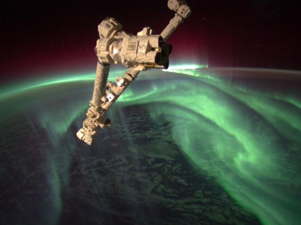 Photo of Aurora Australis or the Southern Lights, taken from the International Space Station, flying an altitude of approximately 240 miles. The ISS's Canadarm2 robot arm is in the foreground. (Photo: NASA)
