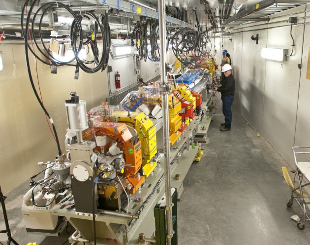 In the foreground, a magnet girder for the National Synchrotron Light Source II. a new state-of-the-art, medium-energy electron storage ring. Each girder is a 14-foot, 8-ton structure holding multiple magnets in the NSLS-II accelerator ring. (Brookhaven National Laboratory/USDOE)