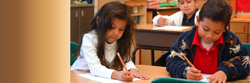 Two elementary school students working at a table