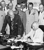President Truman signing the National Security Act into Law