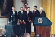 President Ronald Reagan poses with 1988 Baldrige Award recipients, from left to right: Robert W. Galvin, chairman of the board, Motorola Inc.; J.C. Marcus, chairman and CEO, Westinghouse Electric Corporation Commercial Nuclear Fuel Division; Arden C. Sims, president and CEO, Globe Metallurgical Inc.; and U.S. Secretary of Commerce C. William Verity, Jr.