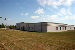 A new $10-million energy-efficient reserve center and vehicle maintenance facility for the 150 Marines of Military Police Company C, Headquarters and Service Battalion, 4th Marine Logistics Group, stands completed following a ribbon cutting ceremony on Wright-Patterson Air Force Base, Ohio, June 18, 2010. The unit deploys to perform security and military law enforcement duties around the world, and the new facility replaces a decaying, inadequate, 1950s-era building that previously housed the unit in Dayton, Ohio.