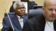 Cabinet Secretary Francis Muthaura, left, in the courtroom of the International Criminal Court, The Hague, Netherlands, Sept. 21, 2011.