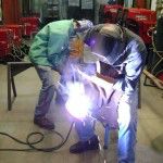 Vern Mesler welds a wrought iron during the workshop.