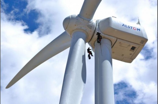 Jonathan Wiley and Eric Kuntzelman rappel more than 300 feet off the ground from a 3 megawatt wind turbine at the National Wind Technology Center (NWTC) near Boulder, CO. (Photo: Dennis Schroeder/NREL)