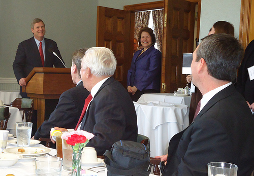 Agriculture Secretary Tom Vilsack addresses Honorees as Business and Cooperative Programs Administrator Judith Canales looks on.