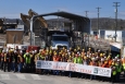 Employees with the K-25 demolition team gather for a photo following the completion of demolition of the north end of the K-25 Building today.