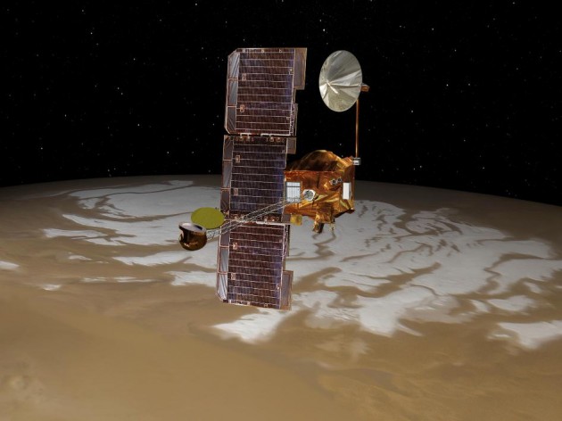 NASA's Mars Odyssey spacecraft passes above Mars' South Pole in this artist's concept illustration. The spacecraft has been orbiting Mars since October 24, 2001. (Photo: NASA/JPL-Caltech/Univ. of Arizona)