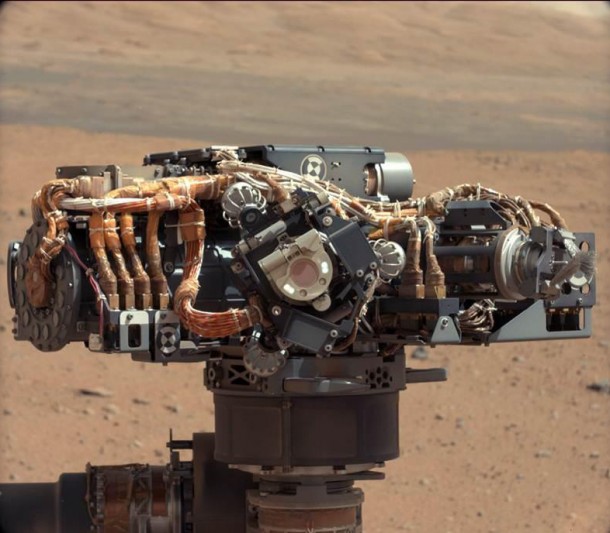 With the Martian landscape in the background this is the Mars Hand Lens Imager (MAHLI), one of seventeen cameras on NASA’s Curiosity rover. The photo was recently taken by the rover’s Mast Camera – MastCam (Photo: NASA/JPL-Caltech/MSSS)