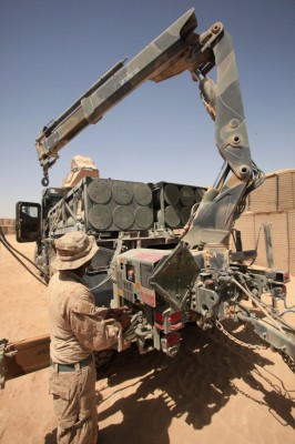 Lance Cpl. Ryan Chandrapaul, the ammunition chief and armory chief for Sierra Battery, 5th Battalion, 11th Marine Regiment, and 21-year-old St. Cloud, Fla. native, conducts a preventative maintenance check on the crane used to haul rockets for the High Mobility Artillery Rocket System, Aug 1.