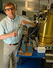 a NIST researcher prepares to analyze a sample with the NIST X-ray microcalorimeter.