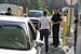 CBP officers interview a role player at the mock port of entry.