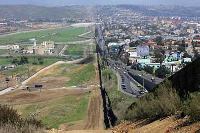 The U.S. Mexican border, U.S. is on the left side of the photo.   