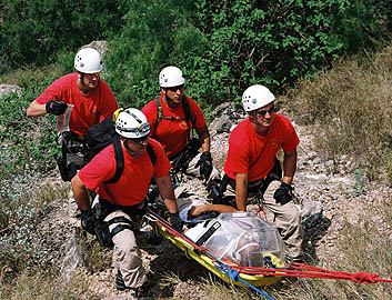 Border Patrol BORSTAR team members effect a difficult rescue in the extreme conditions of a Texas desert.