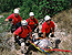 Border Patrol BORSTAR team members effect a difficult rescue in the extreme conditions of a Texas desert.